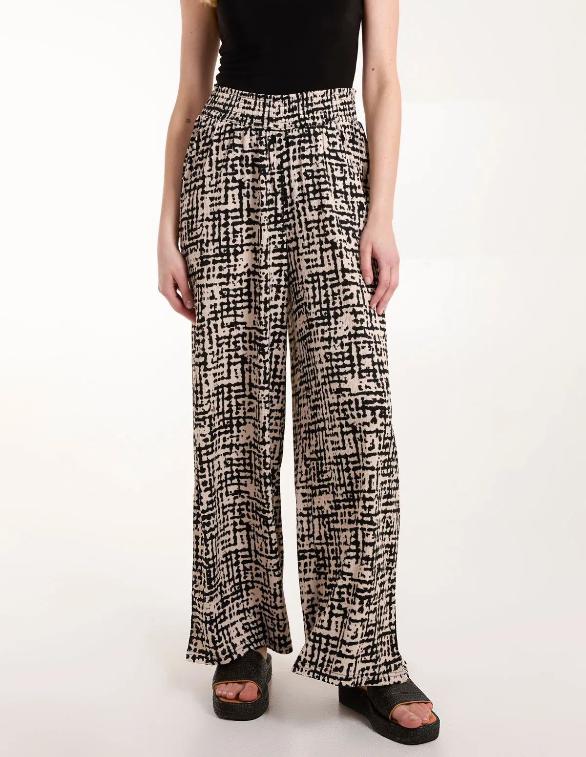 Shirred Waistband Wide Leg Trousers sold by Blue Vanilla