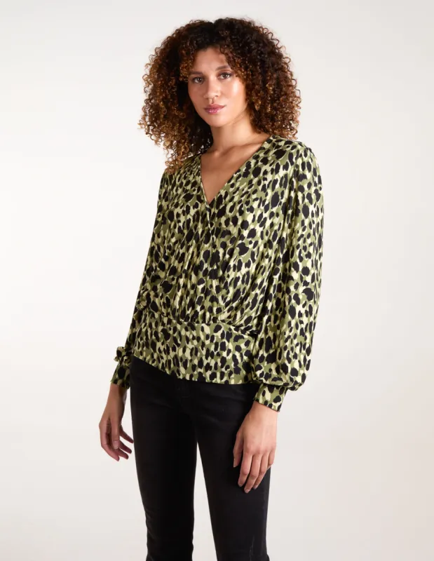 Wrap Front Leopard Print Deep Hem Band Top sold by Blue Vanilla