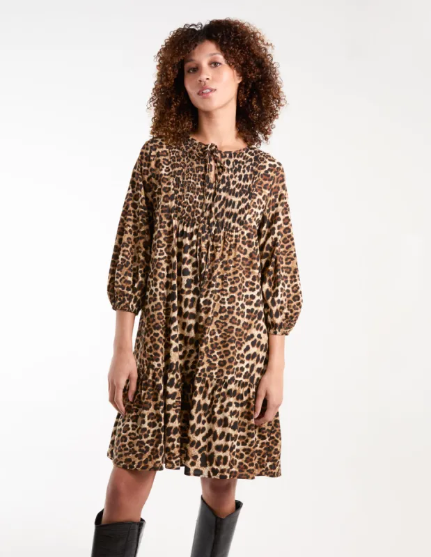Leopard Print Shirred Front Tie Neck Smock Dress sold by Blue Vanilla