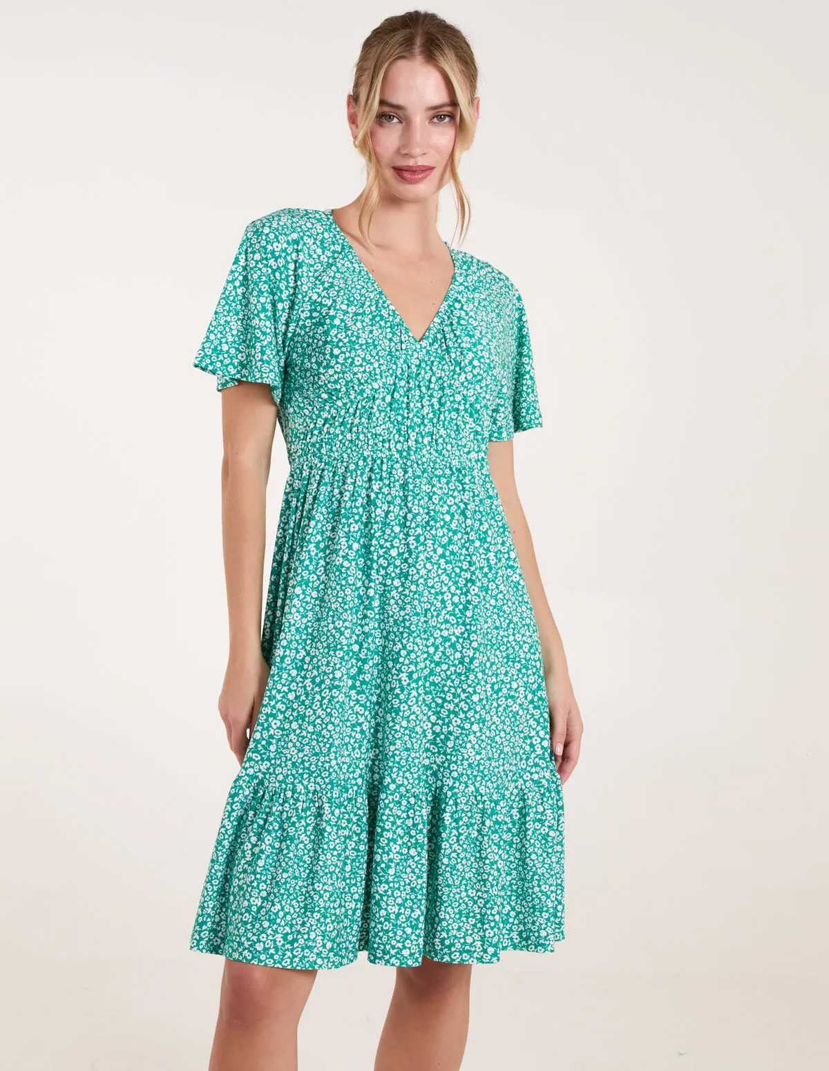 Ditsy Printed Angel Sleeve Elasticated V Neck Dress sold by Blue Vanilla