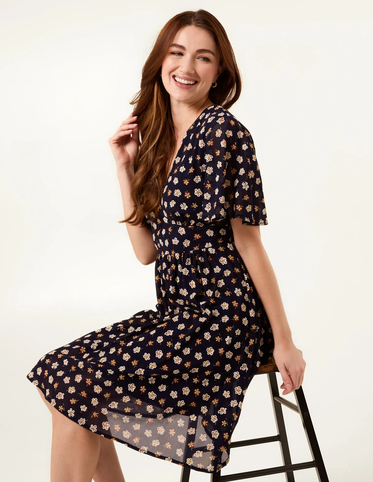 V Neck Tie Back Flower Printed Mini Dress sold by Blue Vanilla product image thumbnail 2