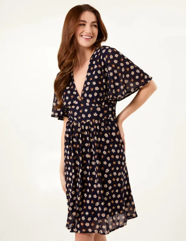 V Neck Tie Back Flower Printed Mini Dress sold by Blue Vanilla