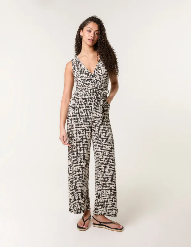 Sleeveless Belted Jumpsuit sold by Blue Vanilla