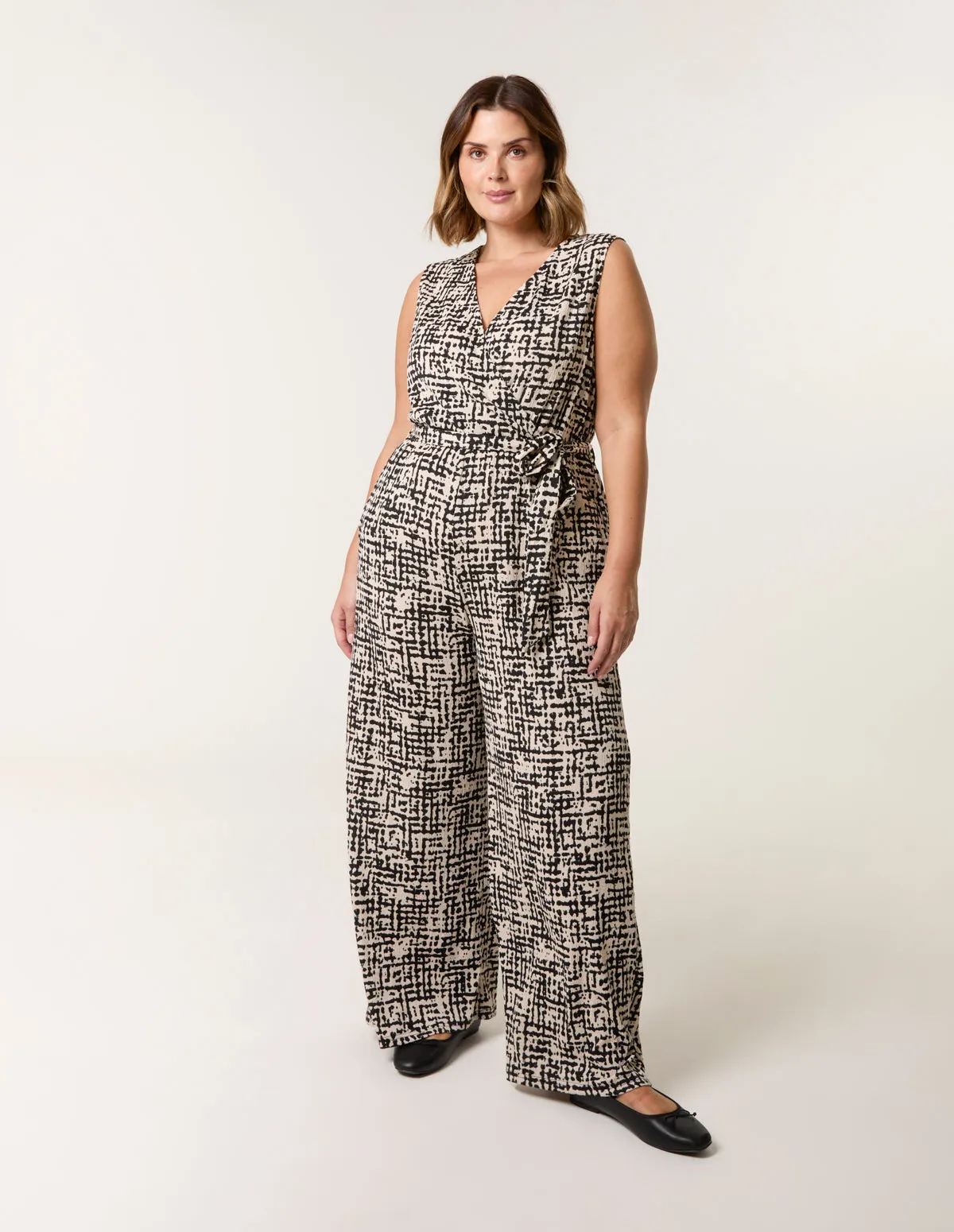 Curve Sleeveless Belted Jumpsuit sold by Blue Vanilla product image thumbnail 2