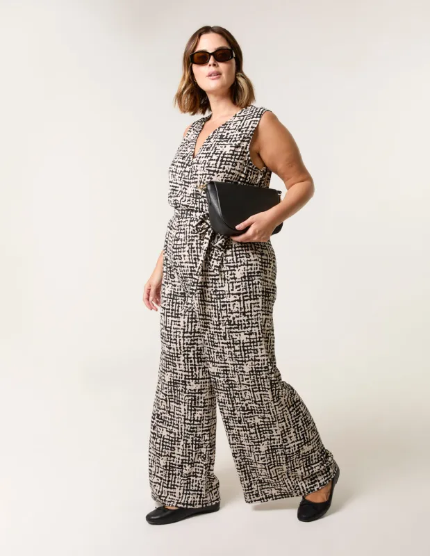Curve Sleeveless Belted Jumpsuit sold by Blue Vanilla