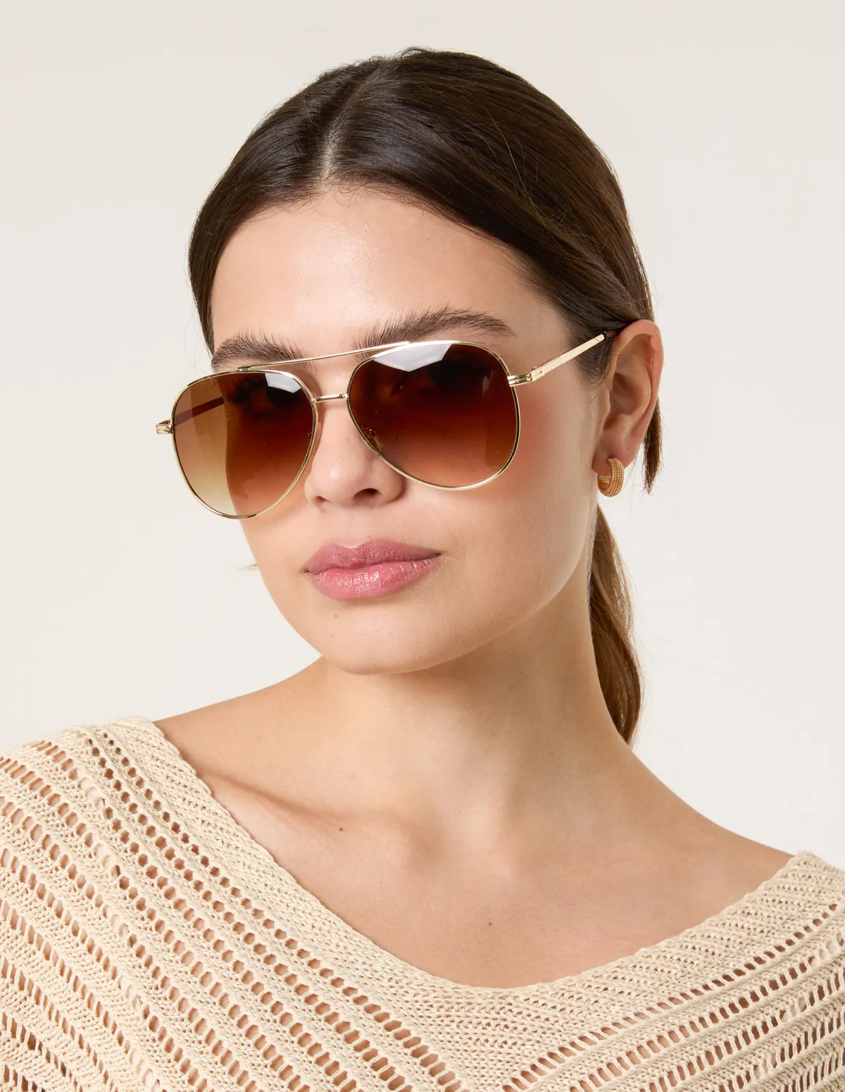 Gold Frame Aviators sold by Blue Vanilla