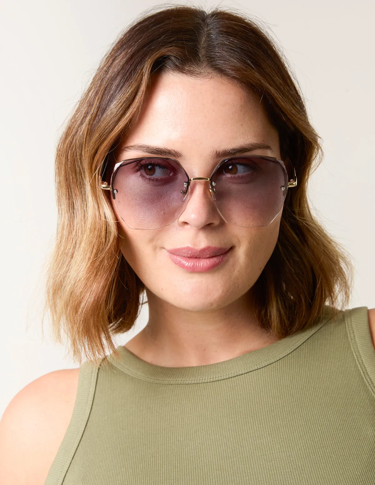 Frameless Purple Lens Sunglasses sold by Blue Vanilla product image thumbnail 2