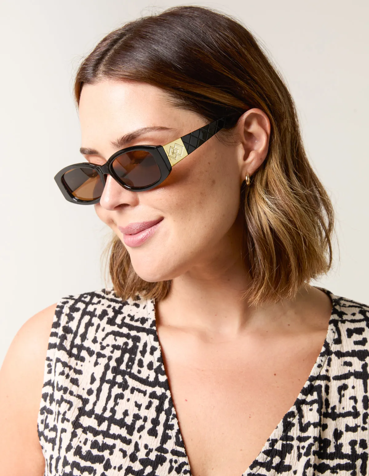 Brown Frame Sunglasses sold by Blue Vanilla