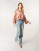 Printed V Neck Puffball Top sold by Blue Vanilla
