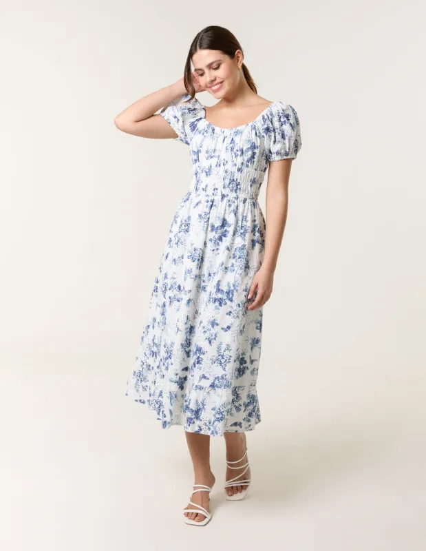 Puff Sleeve Shirred Print Dress sold by Blue Vanilla