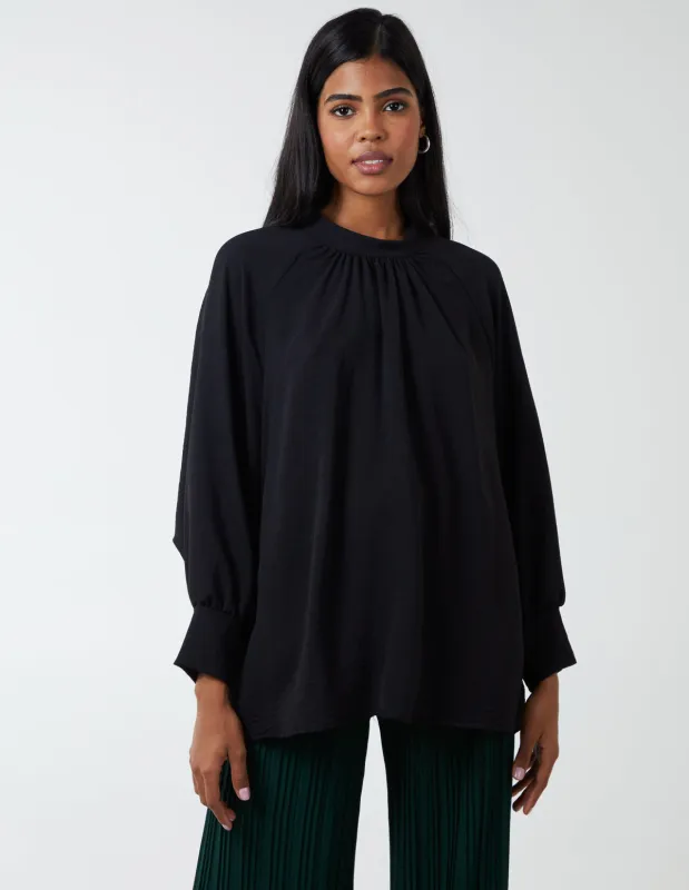 Pleated Front Blouson Top sold by Blue Vanilla
