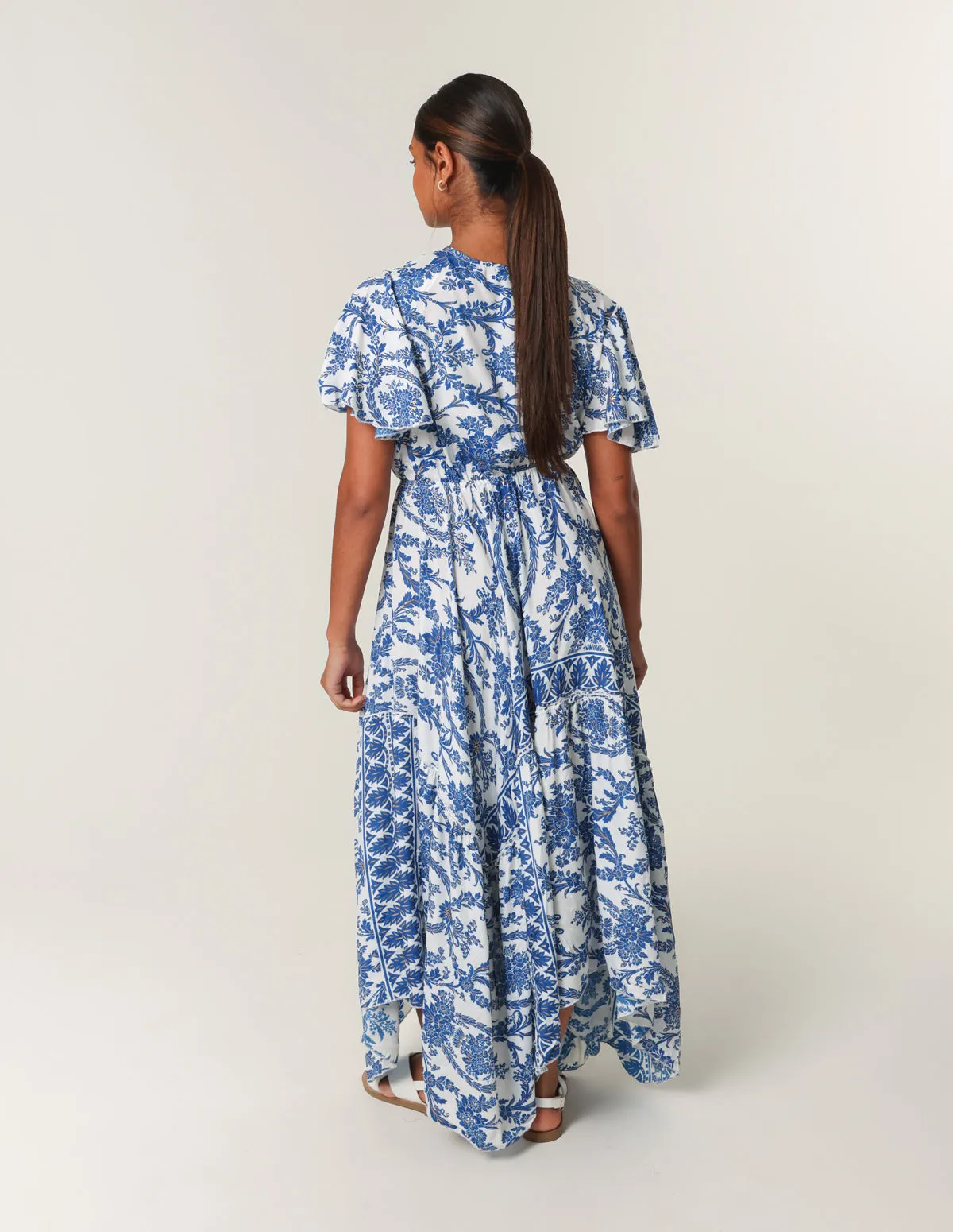 Asymmetric Hem Wrap Dress sold by Blue Vanilla product image thumbnail 4