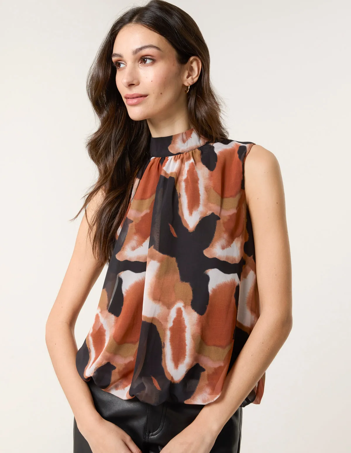 Printed Sleeveless Puff Hem Blouse sold by Blue Vanilla product image thumbnail 3