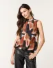 Printed Sleeveless Puff Hem Blouse sold by Blue Vanilla