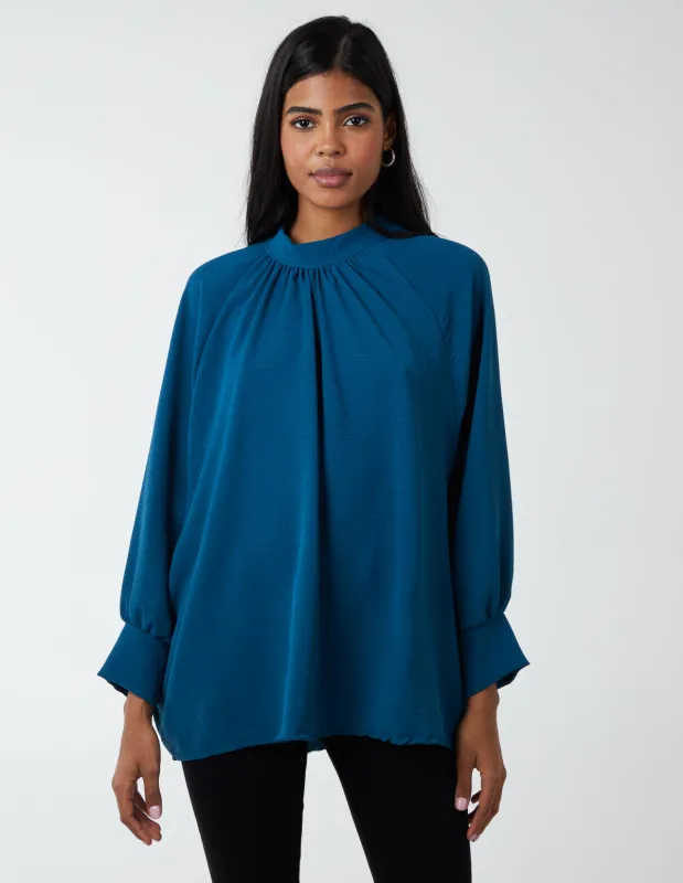 Pleated Front Blouson Top sold by Blue Vanilla
