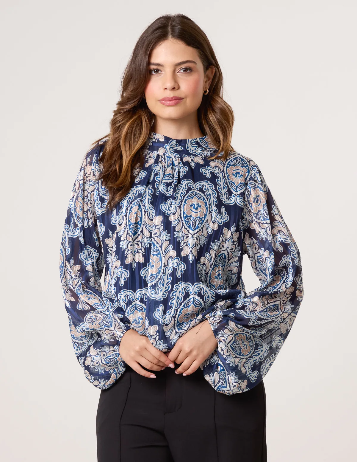 High Neck Bubble Hem Printed Blouse sold by Blue Vanilla