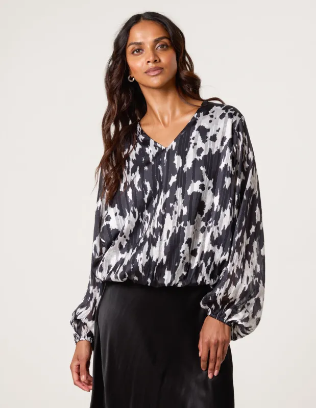 Metallic V Neck Bubble Hem Blouse sold by Blue Vanilla