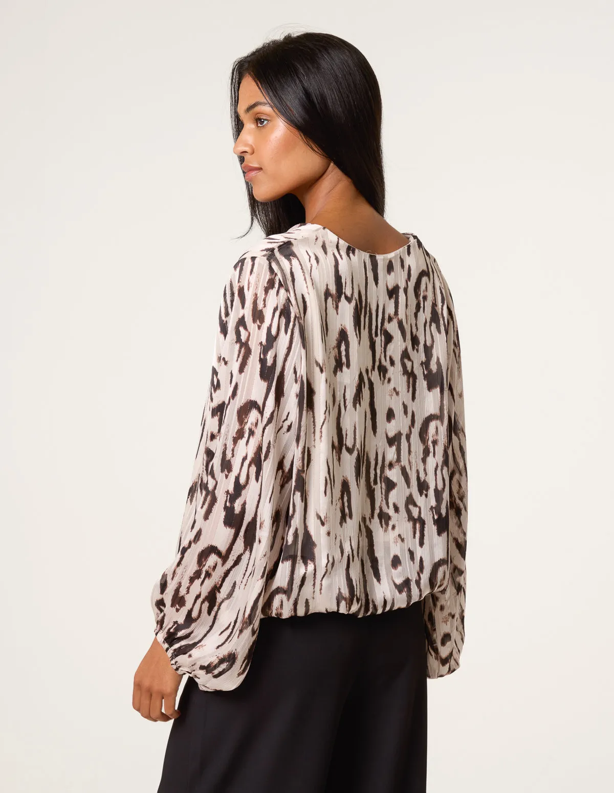 Animal Print Puffball V Neck Top sold by Blue Vanilla product image thumbnail 4