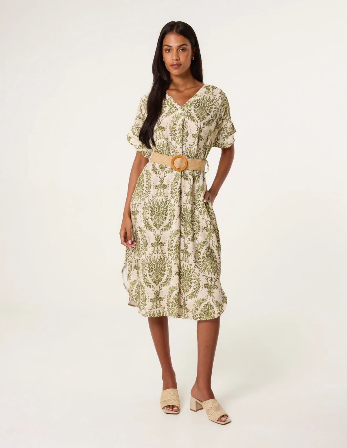 Printed V Neck Dress With Woven Belt sold by Blue Vanilla