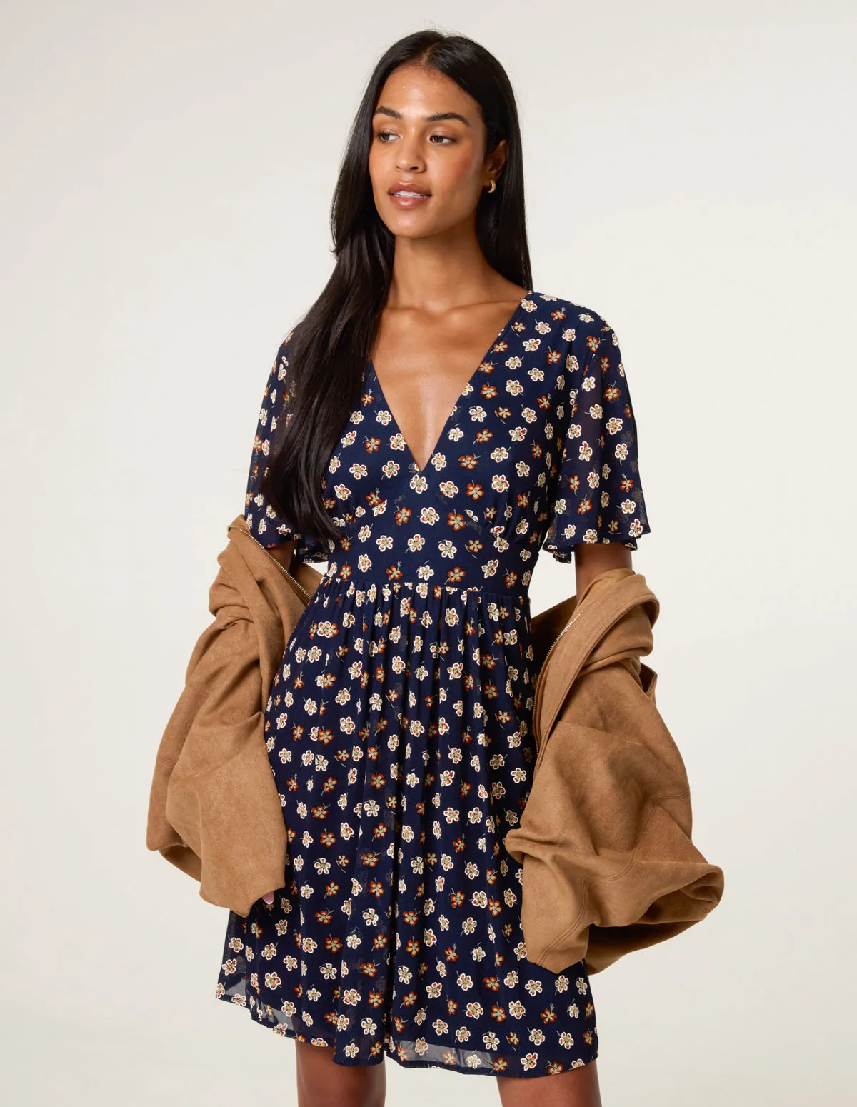 Ditsy Floral V Neck Tie Back Mini Dress sold by Blue Vanilla product image thumbnail 2