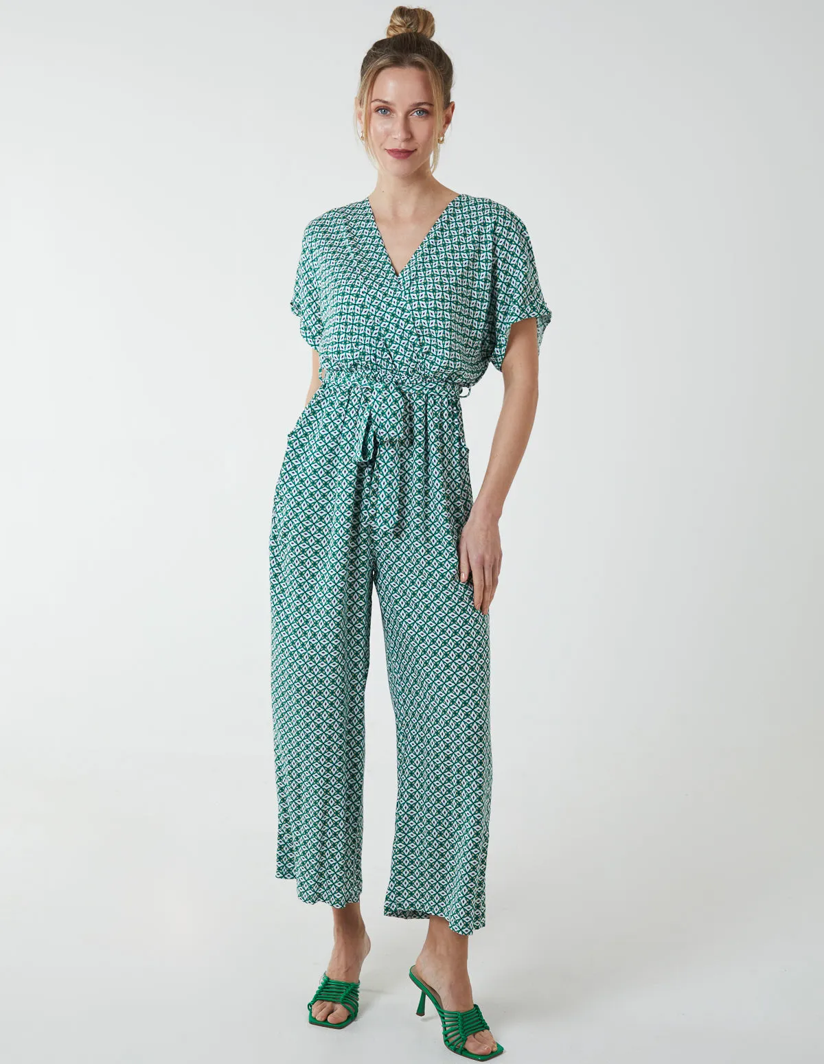 Geometric Gold Detail Cross Over Jumpsuit sold by Blue Vanilla