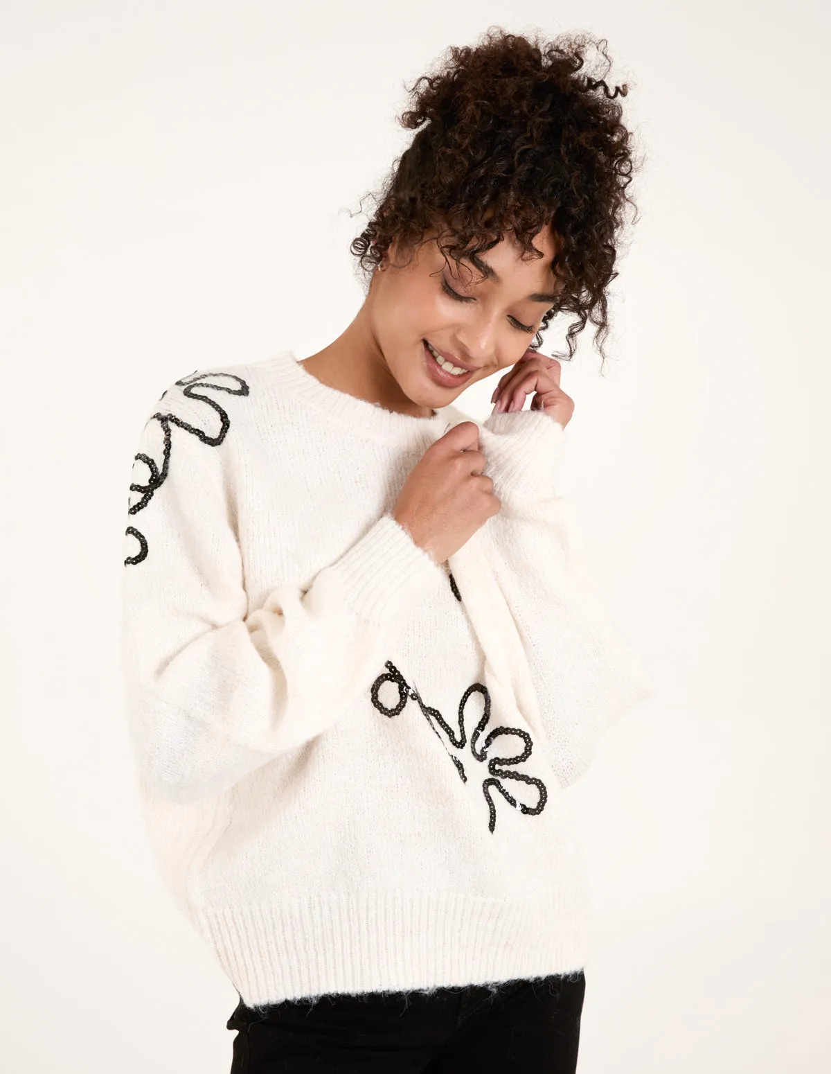 Abstract Flower Sequin Jumper sold by Blue Vanilla