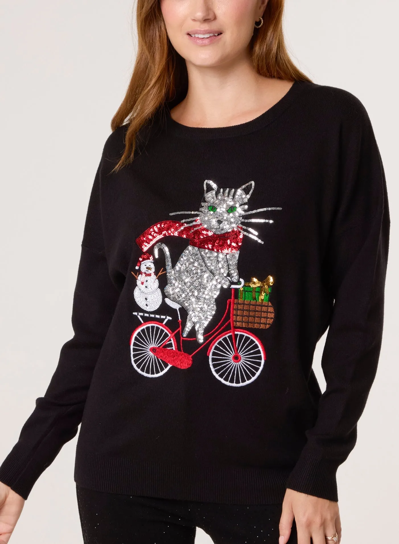 Christmas Cat On A Bike Jumper sold by Blue Vanilla