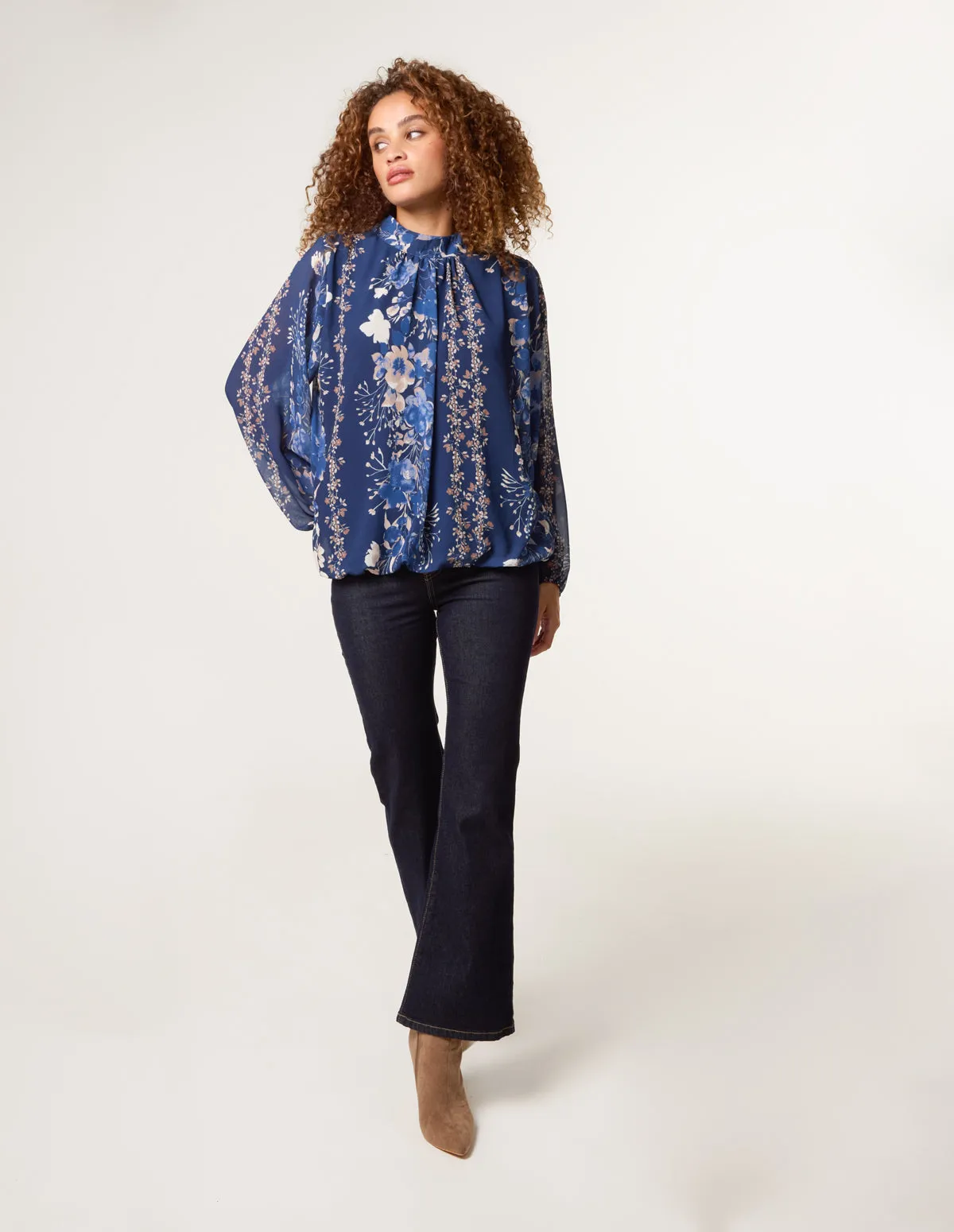 High Neck Puffball Floral Blouse sold by Blue Vanilla