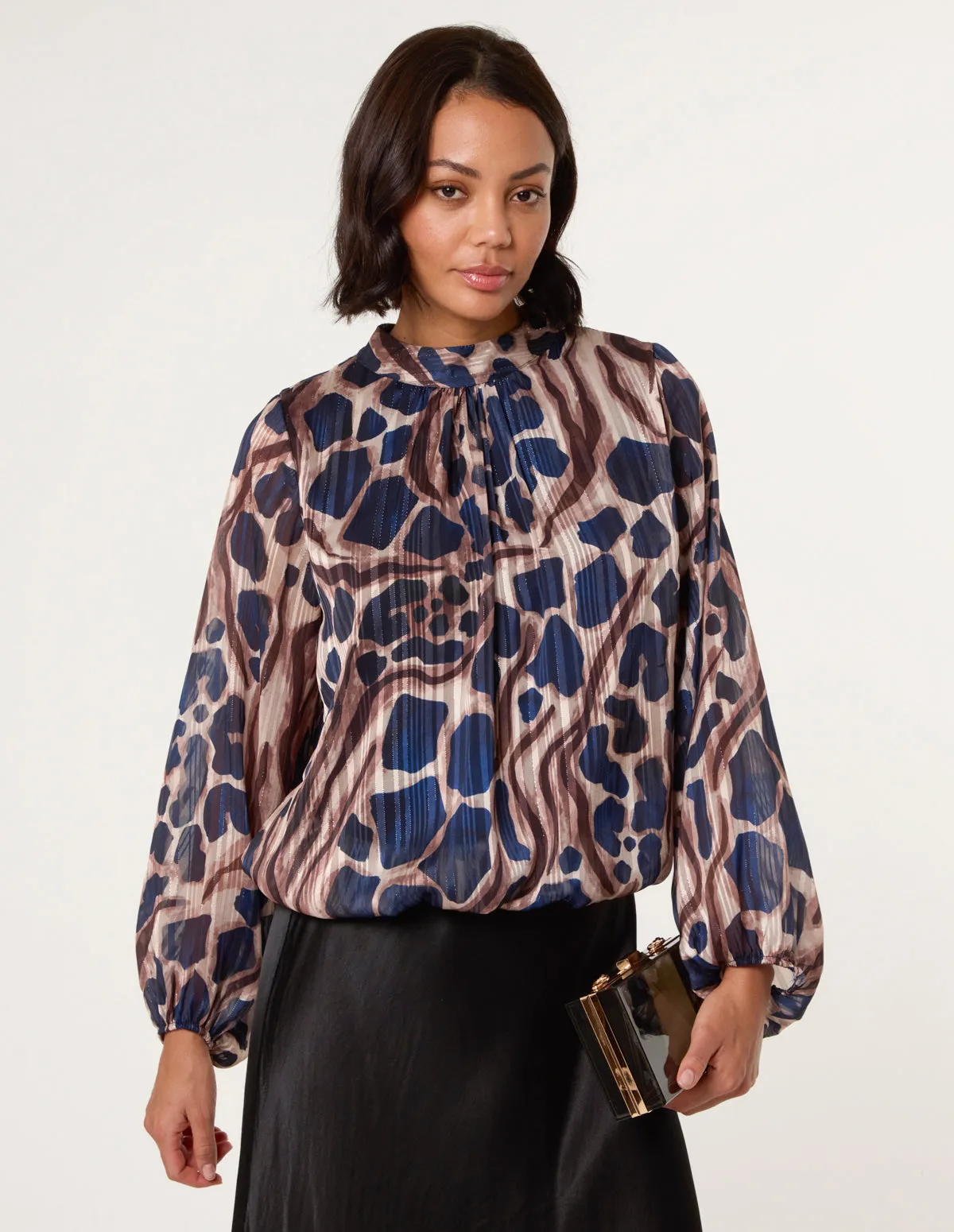 Metallic Stripe Puffball Blouse sold by Blue Vanilla