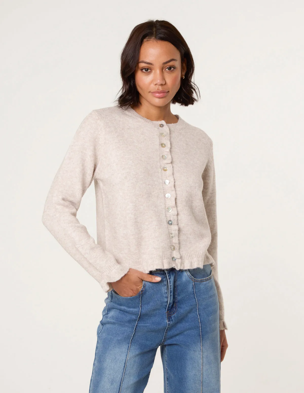 Cardigan With Ruffle Trim sold by Blue Vanilla