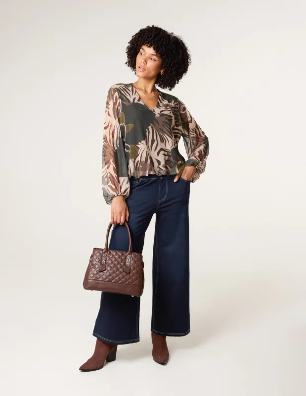 Printed Mesh V Neck Puffball Top sold by Blue Vanilla