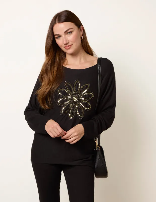 Embroidered Sequin Flower Top sold by Blue Vanilla