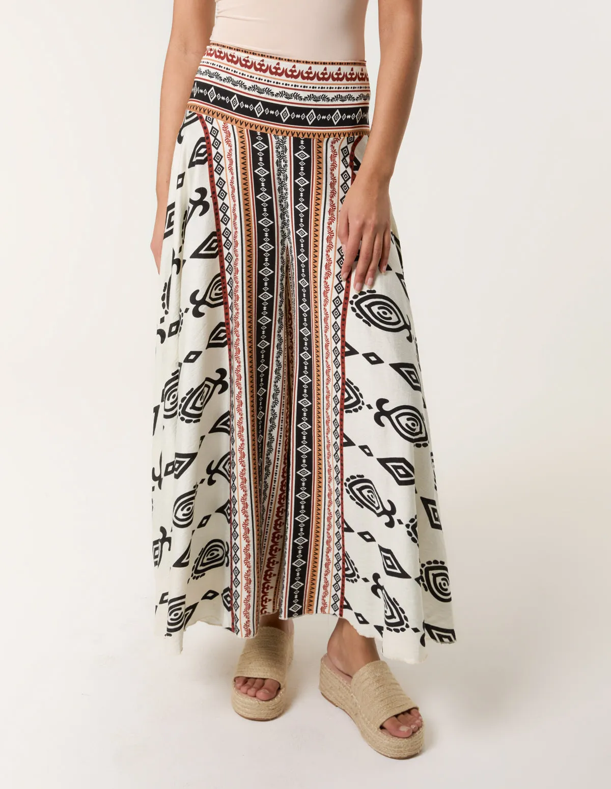 Flared Trousers With Geometric Print sold by Blue Vanilla