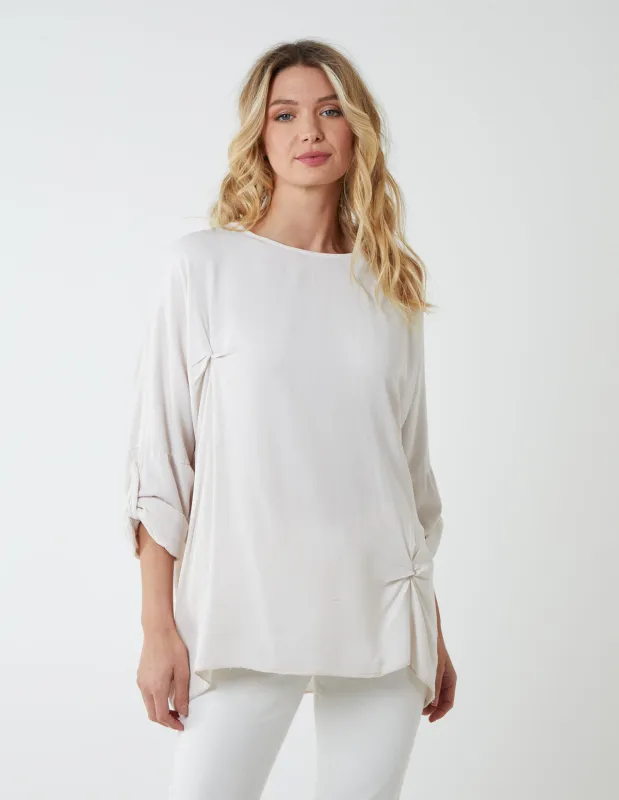 Double Twist Oversize Turn Back Sleeve Top sold by Blue Vanilla
