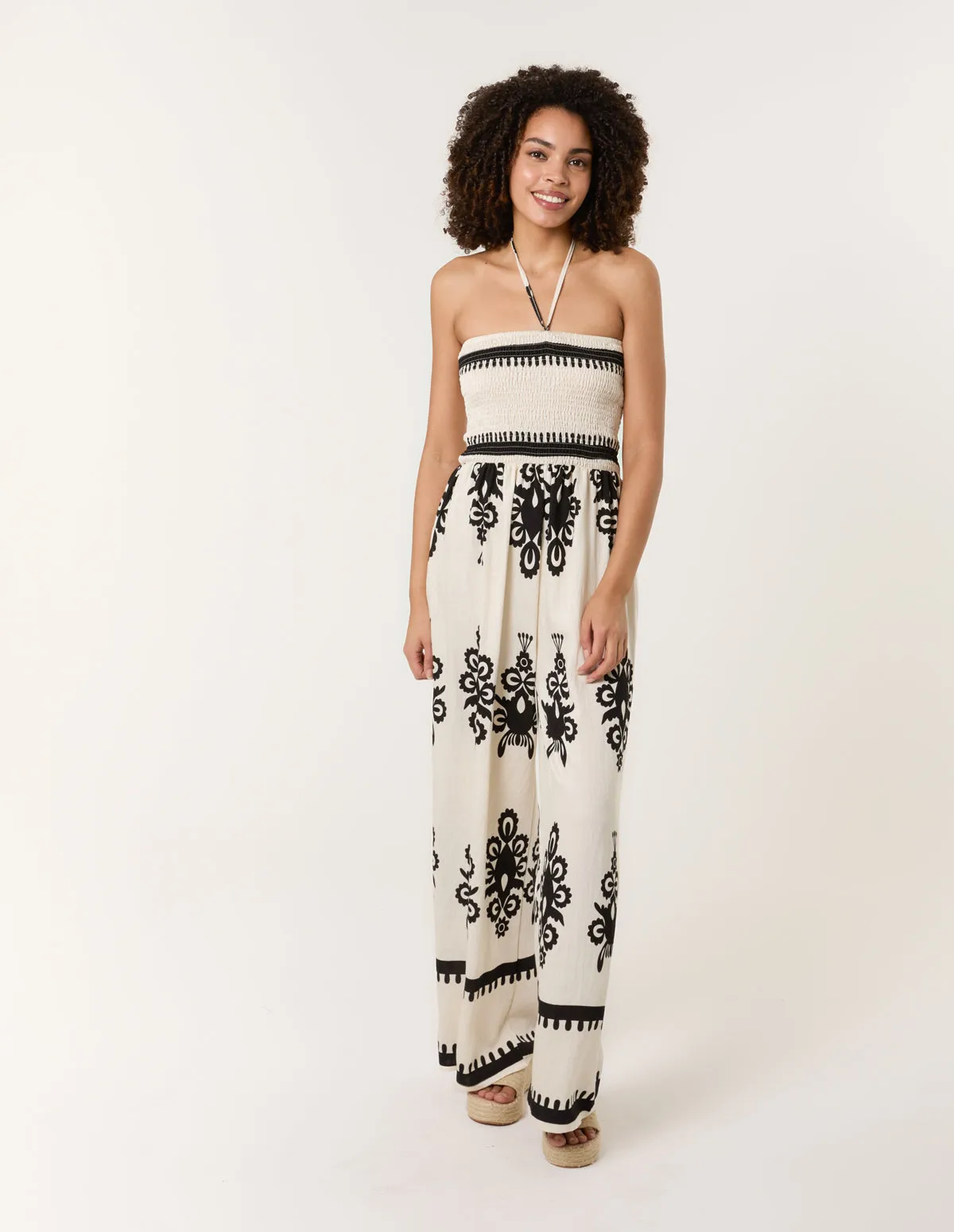 Halter Neck Shirred Waist Jumpsuit sold by Blue Vanilla