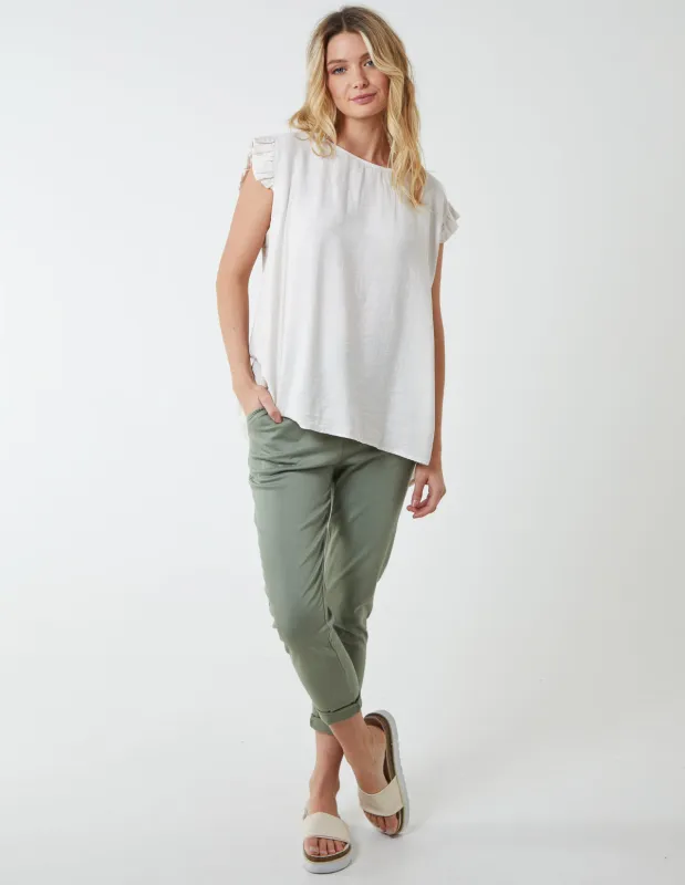 Button Back Frill Shoulder Top sold by Blue Vanilla