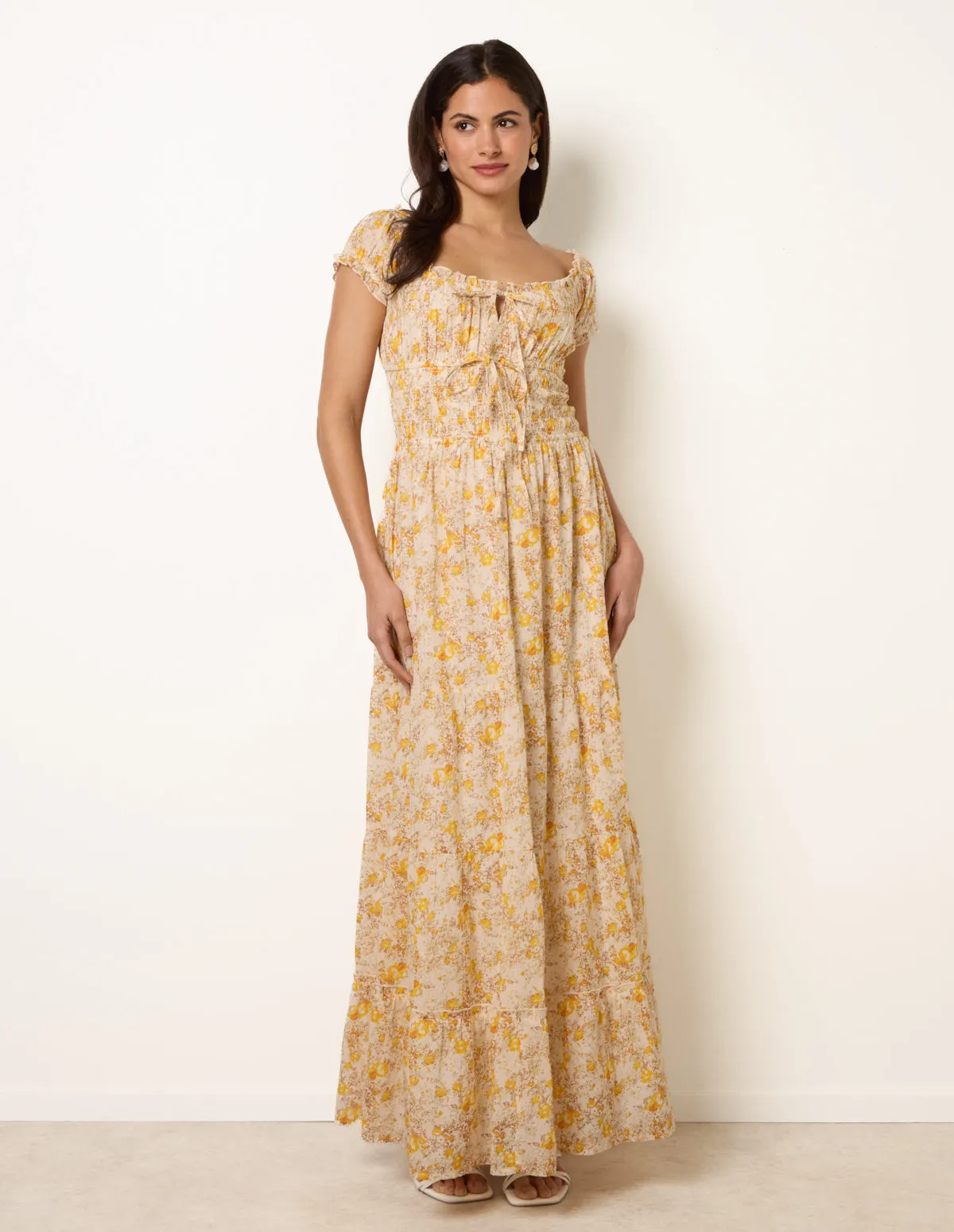 Double Front Tie Shirred Ditsy Floral Maxi Dress sold by Blue Vanilla