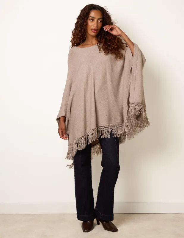 Fringe Hem Button Side Cape made by Blue Vanilla