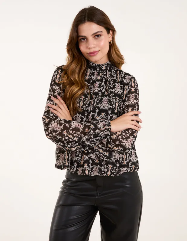 Bubble Hem High Neck Printed Top sold by Blue Vanilla