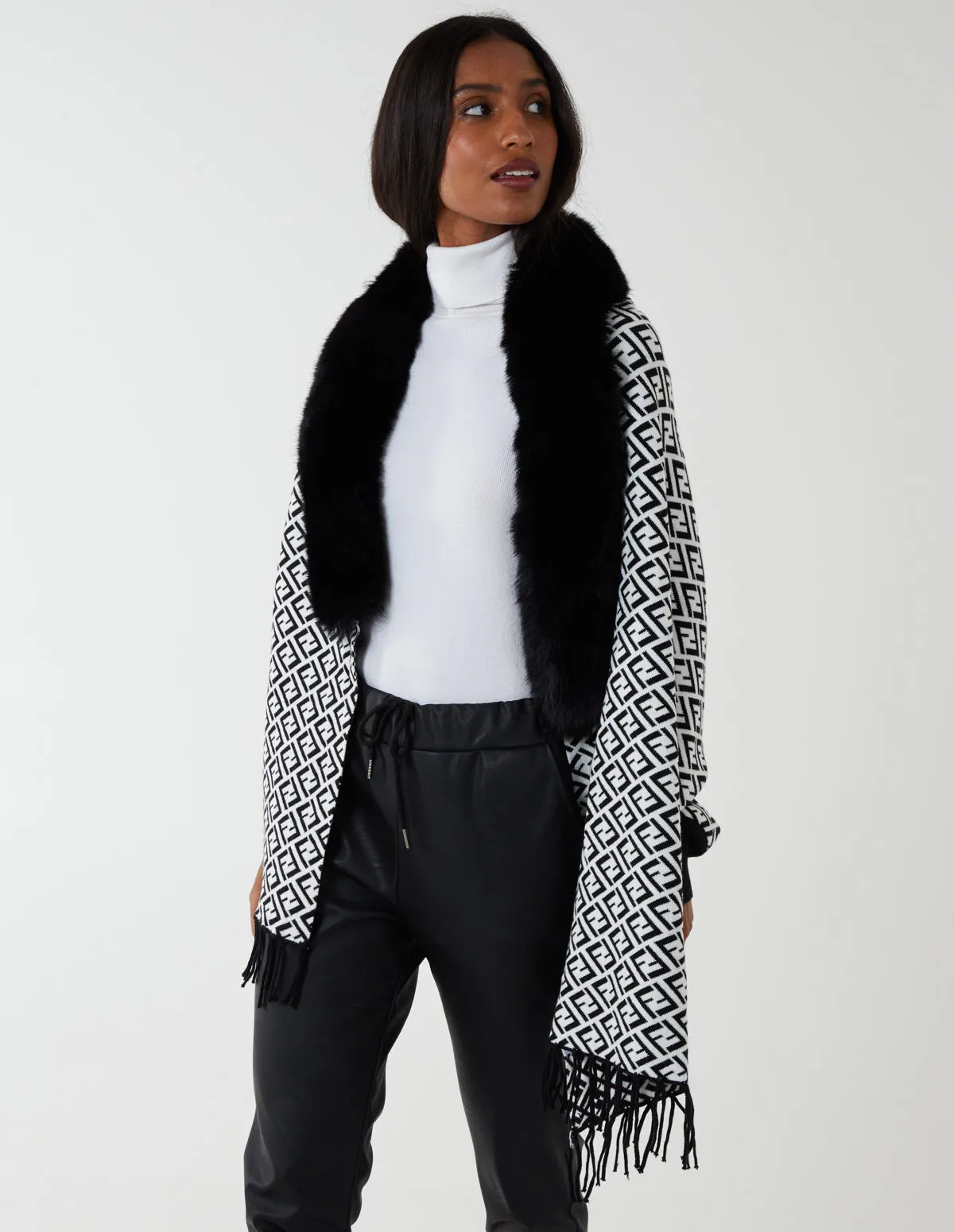 Faux Fur Lined Monogram Poncho sold by Blue Vanilla