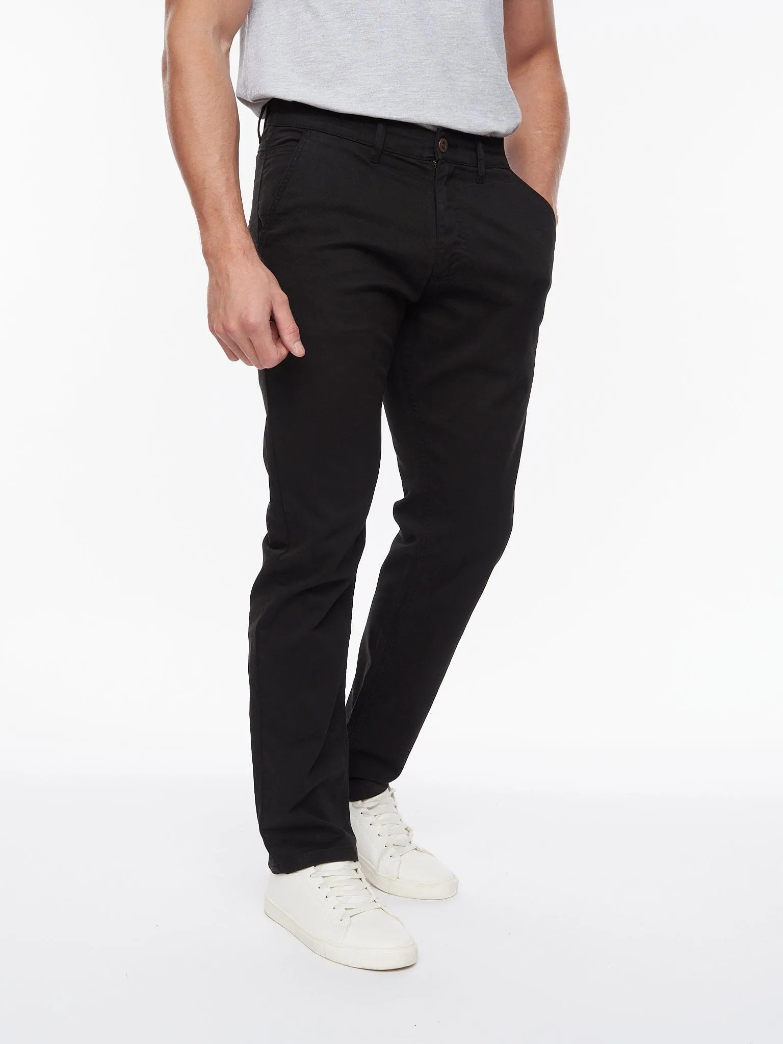 Tasman Chinos Black sold by Brand Corner