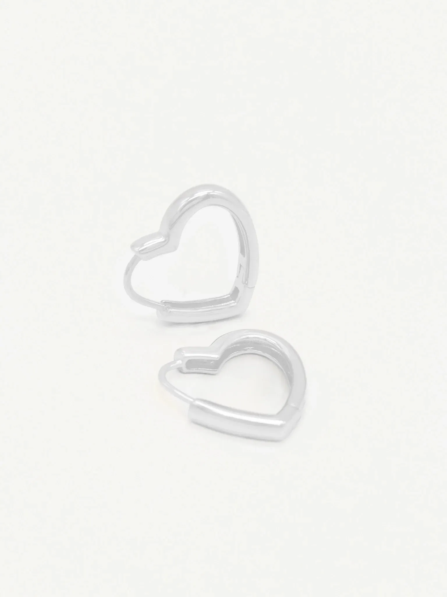 Simple heart earrings - silver sold by Brando