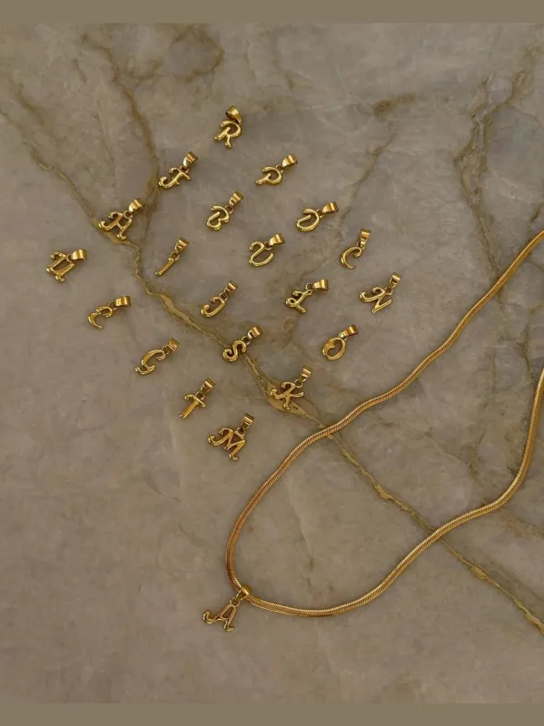 Bone letter necklace gold - gold sold by Brando