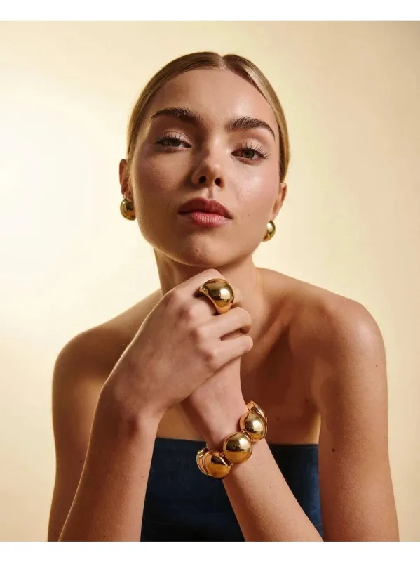 Big elastic bracelet - gold sold by Brando