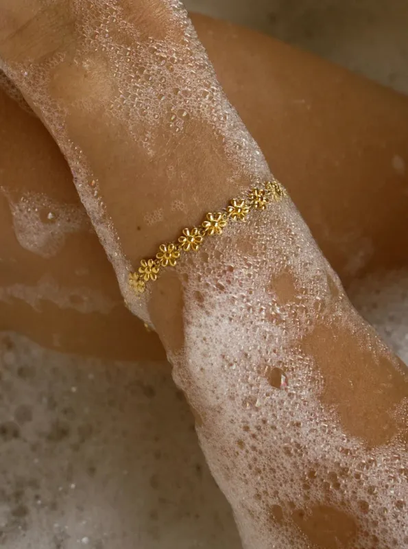 Flower bracelet - gold sold by Brando