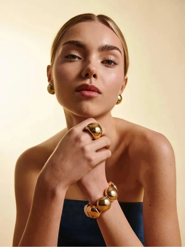 Big elastic bracelet - gold sold by Brando