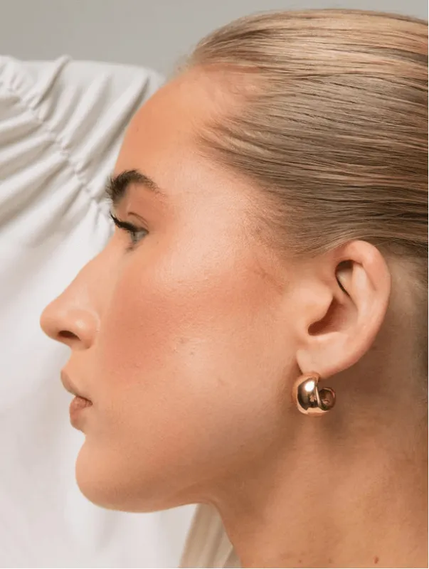 Halo earrings - gold sold by Brando