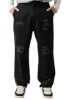 Kaotiko Relaxed Urban Embroided Lange Broek Zwart sold by Burned Sports