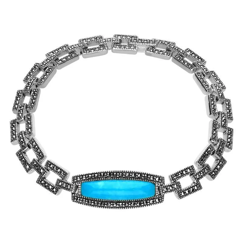 Sterling Silver Turquoise and Marcasite Oblong Curved Link Bracelet sold by C.W. Sellors
