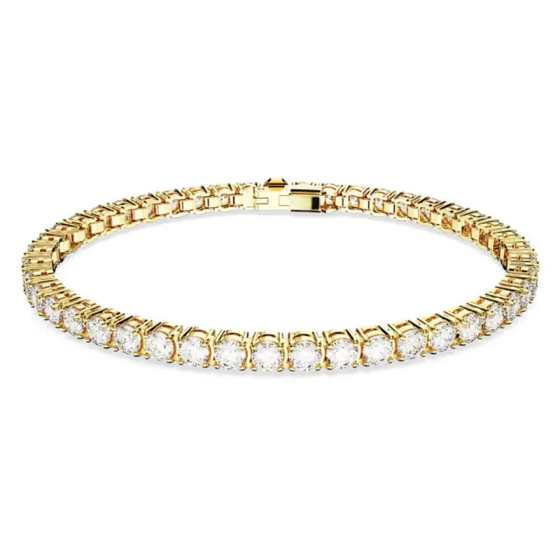 Swarovski Matrix Gold Tone Plated White Crystal Small Round Cut Tennis Bracelet sold by C.W. Sellors